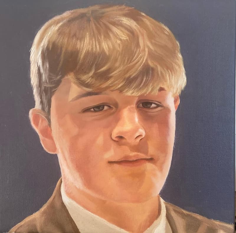 Oil portrait of a school boy with fair hair on a dark background.