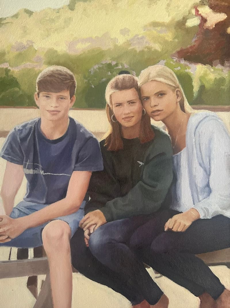 Oil portrait of three children, two girls and a boy on a beach
